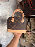 LV ALMA AVEC LA HOUSSE
