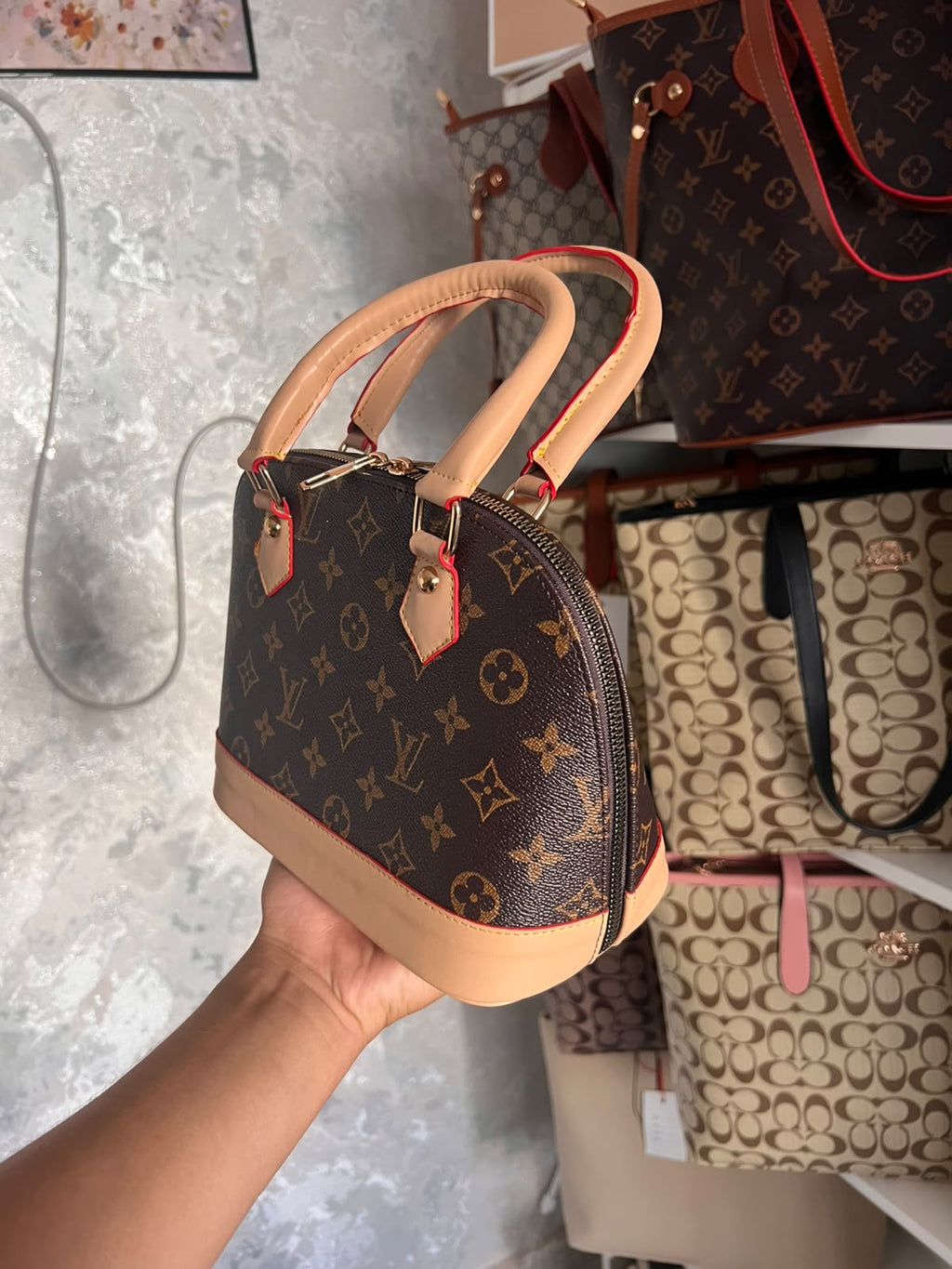 LV ALMA AVEC LA HOUSSE